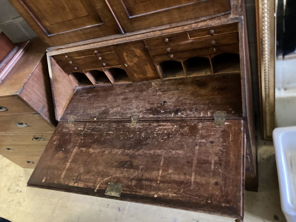 A George III oak bureau bookcase, width 98cm, depth 52cm, height 219cm